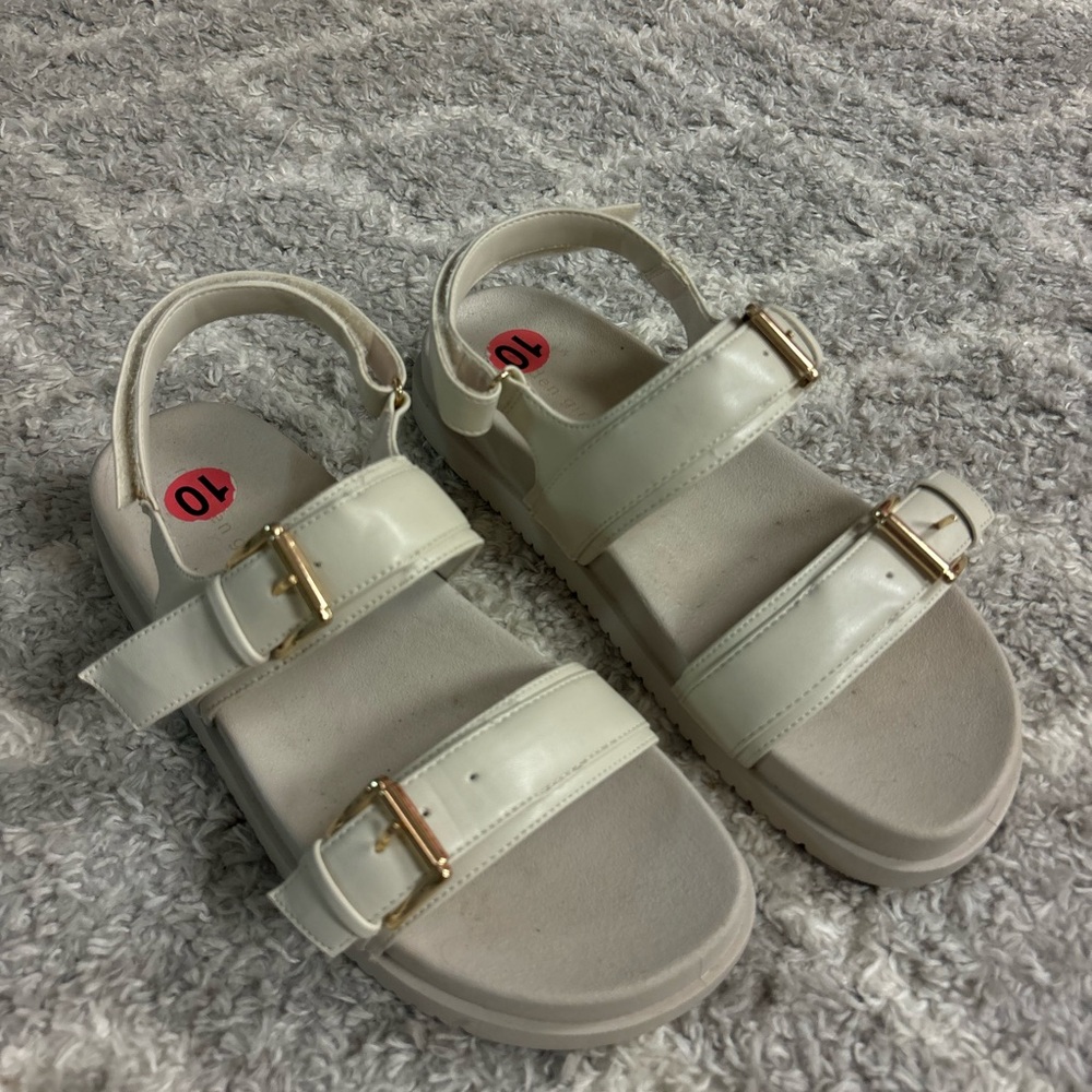 Stylish Cream Sandals with Gold Buckles